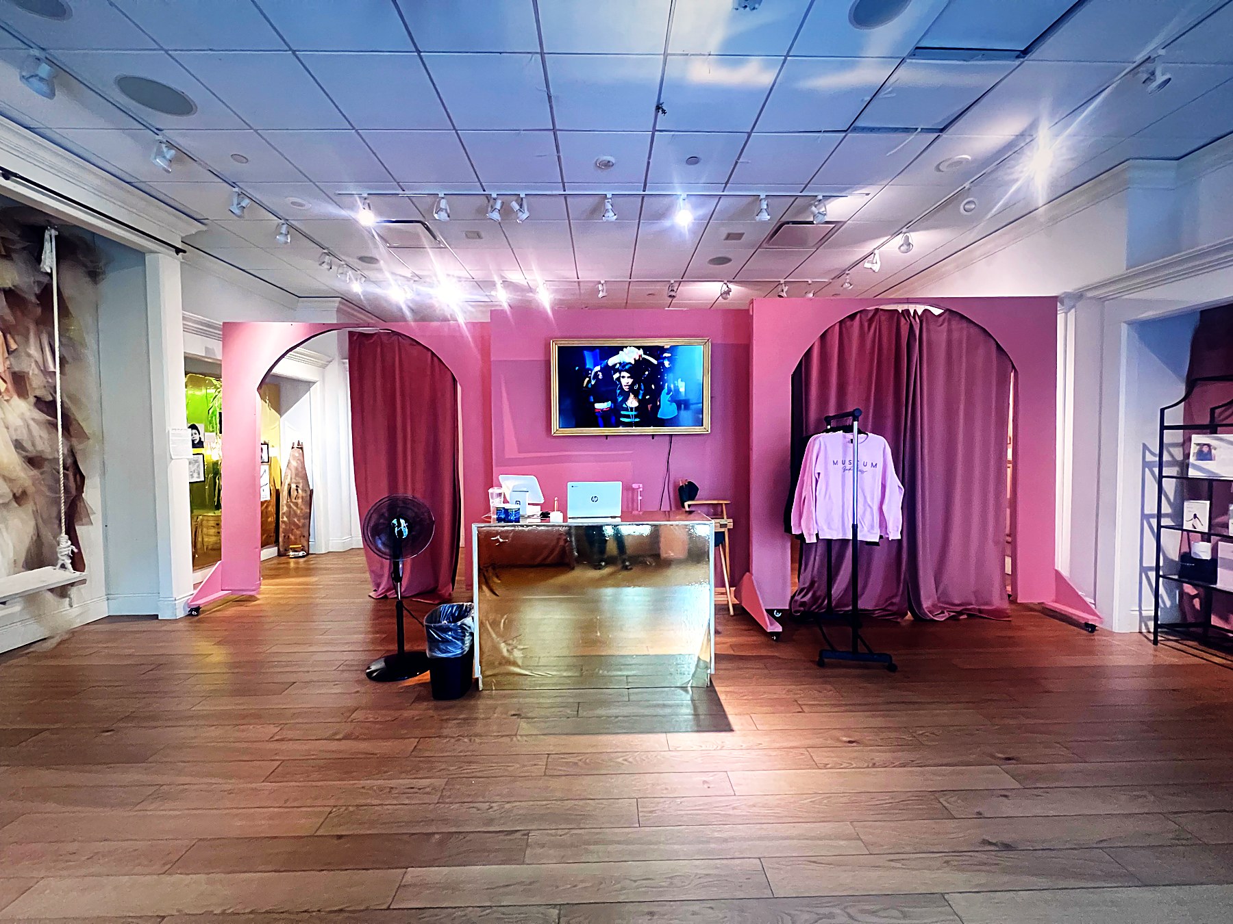 Rose-clay pink archways leading to the museum boutique at Museum for Black Girls