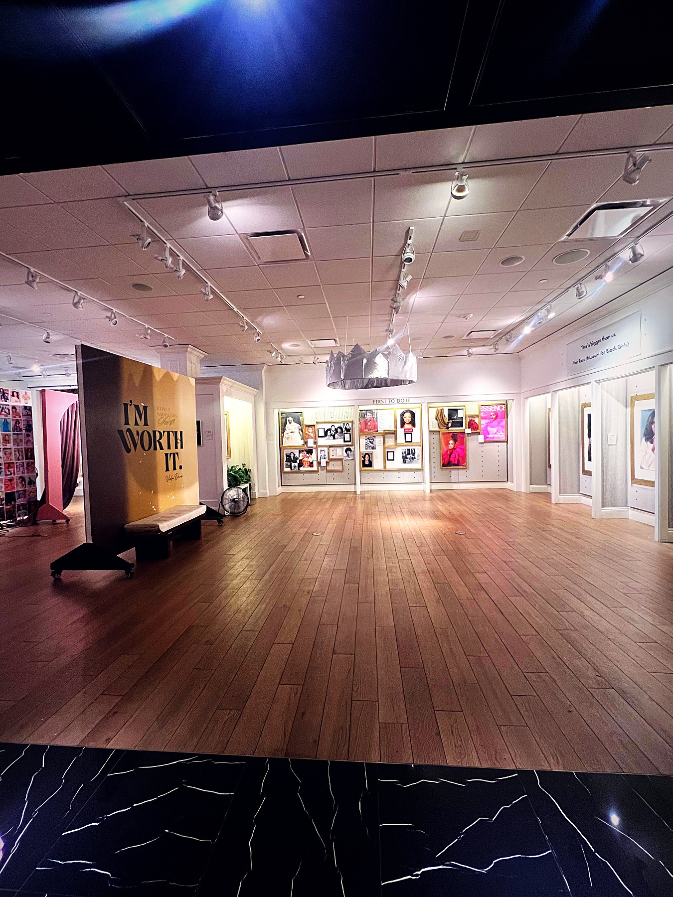 The 'I'm Worth It' statement wall inside the First To Do It gallery at Museum for Black Girls